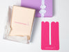 pink pregnancy support tape beside gift box