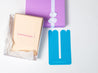 blue tummytape pregnancy support tape beside purple gift box