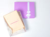 tummytape packaging beside purple gift box